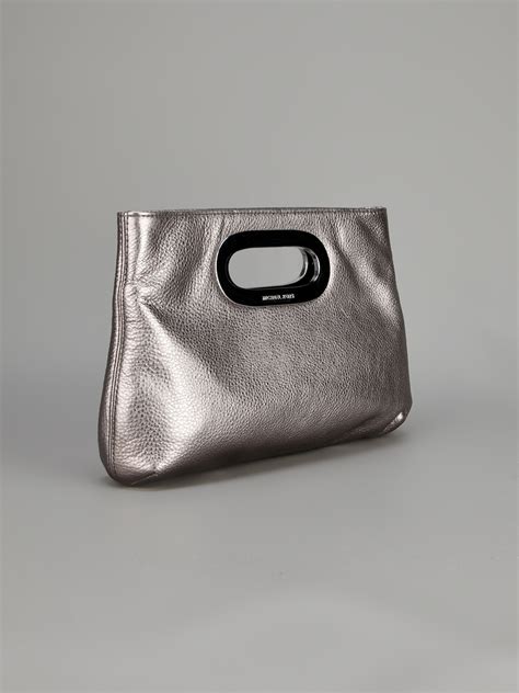 michael kors silver clutch purse|Michael Kors berkley clutch.